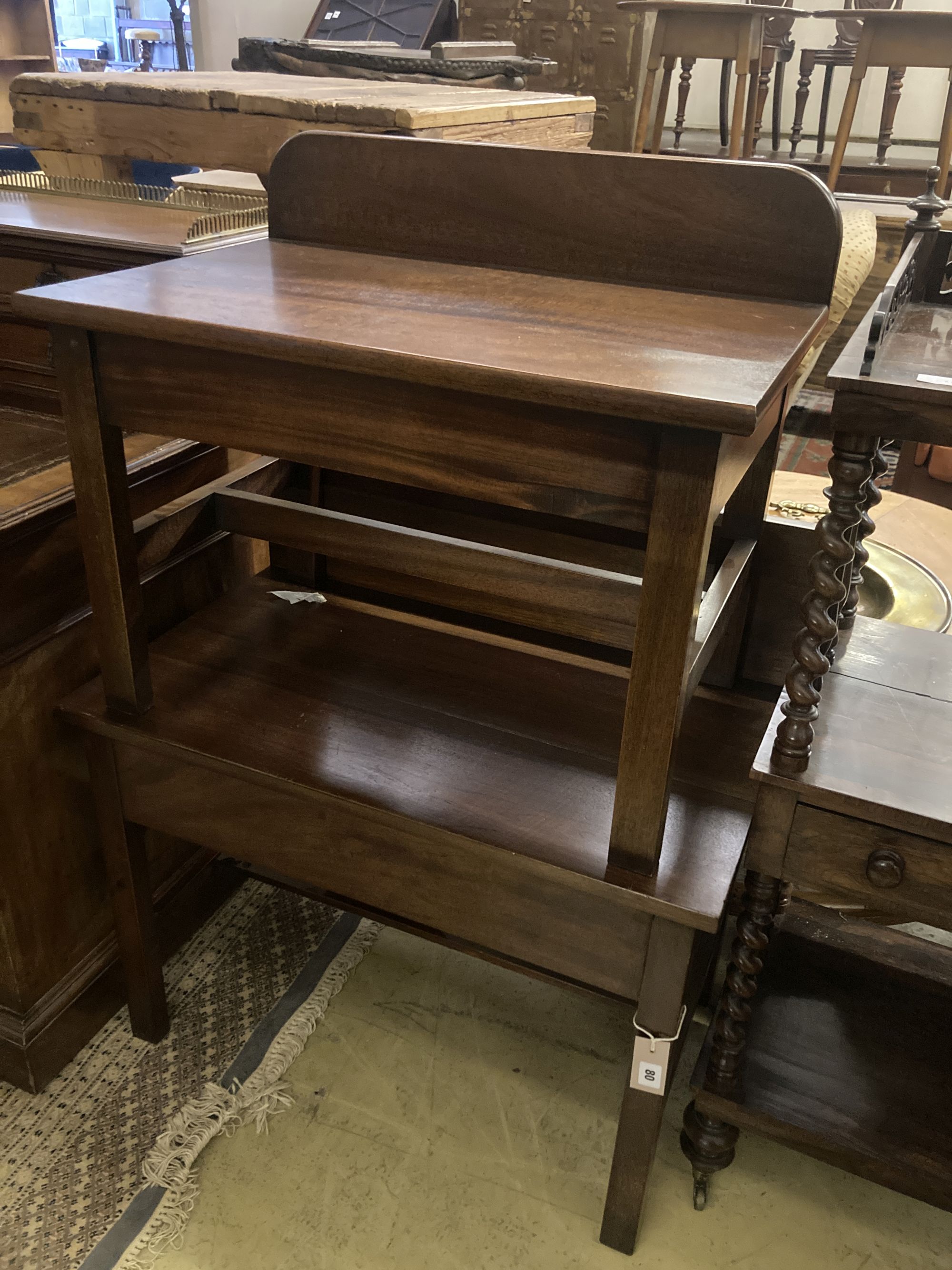 A near pair of mahogany luggage racks, larger 76 x 44cm height 66cm